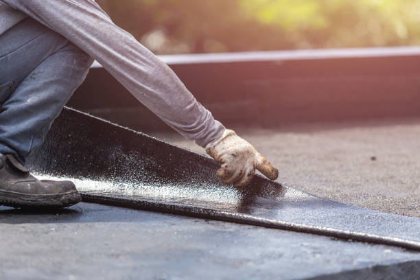 Professional Waterproofing technician working in Highland, MD